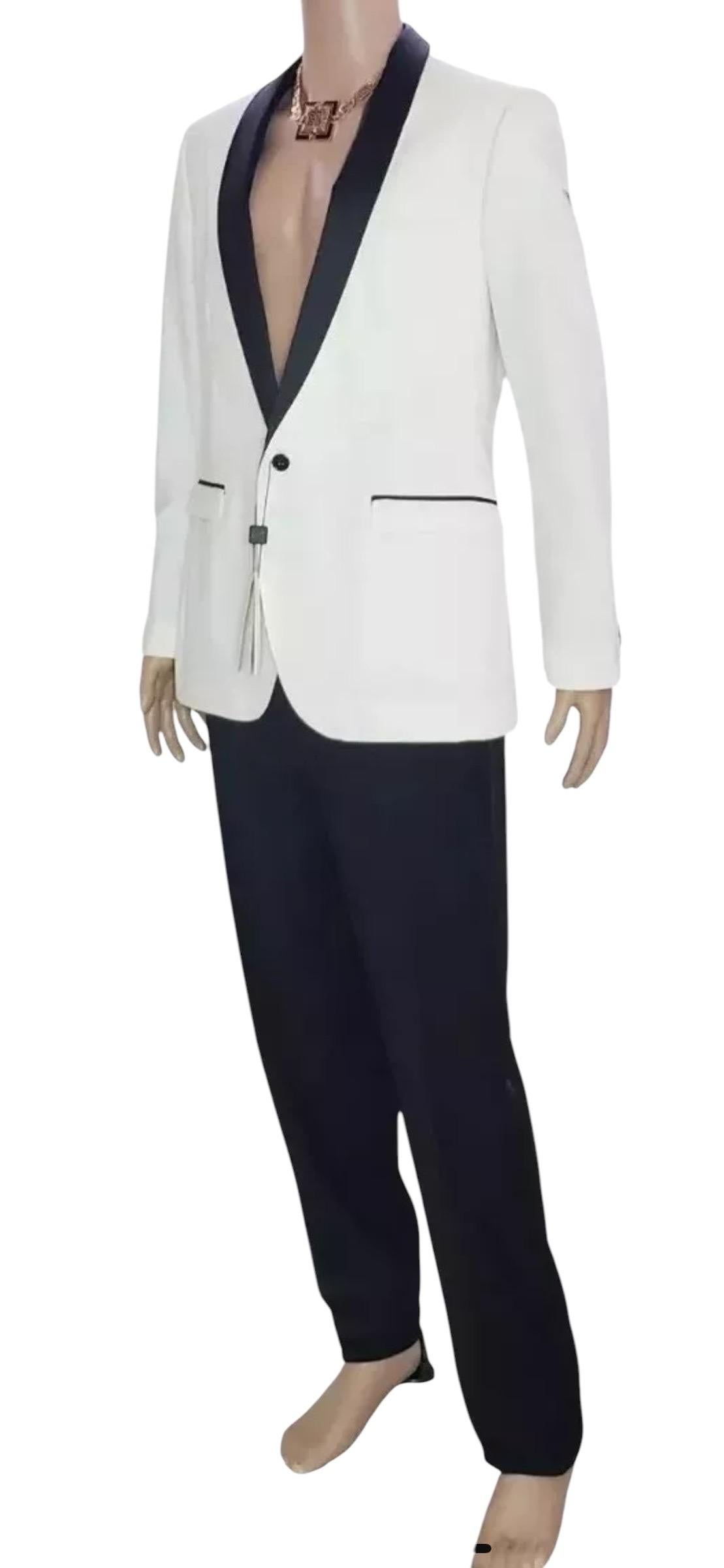 Dolce and Gabbana D&G
Black pants & white jacket tuxedo suit  
Optic black silk collar and waist
The pockets are also trimmed with optic black silk.
IT Size 50 -  US 40 (L)
Measurements:
Jacket:
shoulder to shoulder 19