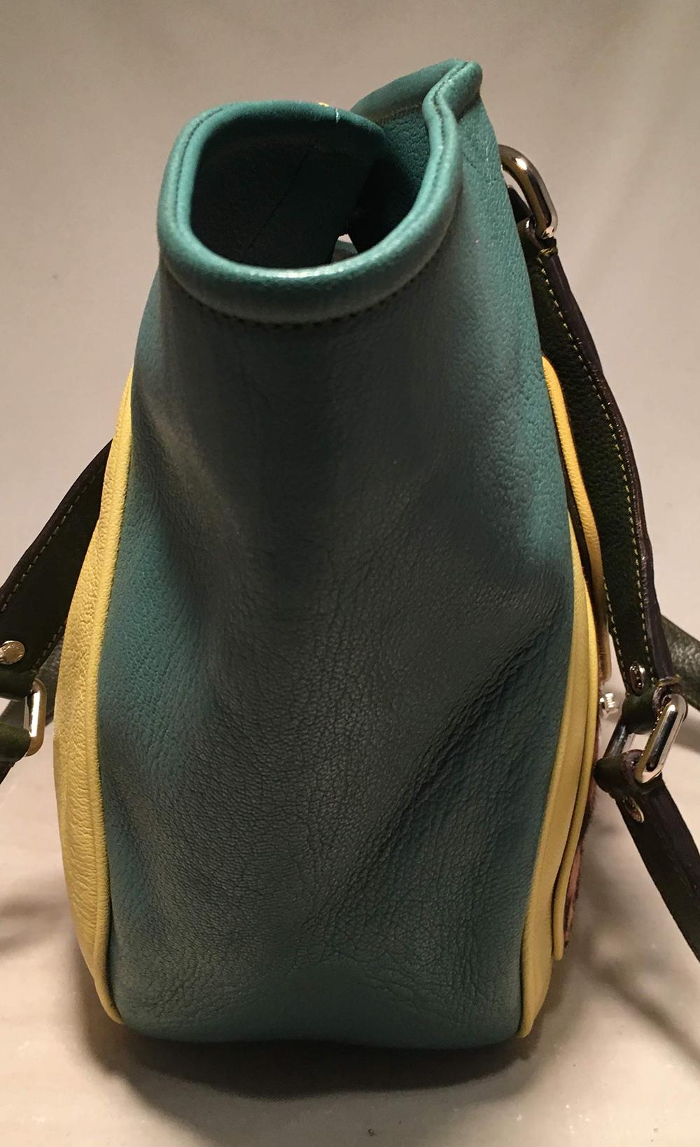 Dolce and Gabbana Green Color Block Miss Catch Large Lock Tote in very good condition. From the Miss Catch collection, this large lock tote style is perfect for a variety of occasions. Dark Jade green, yellow, and olive green leathers in a color
