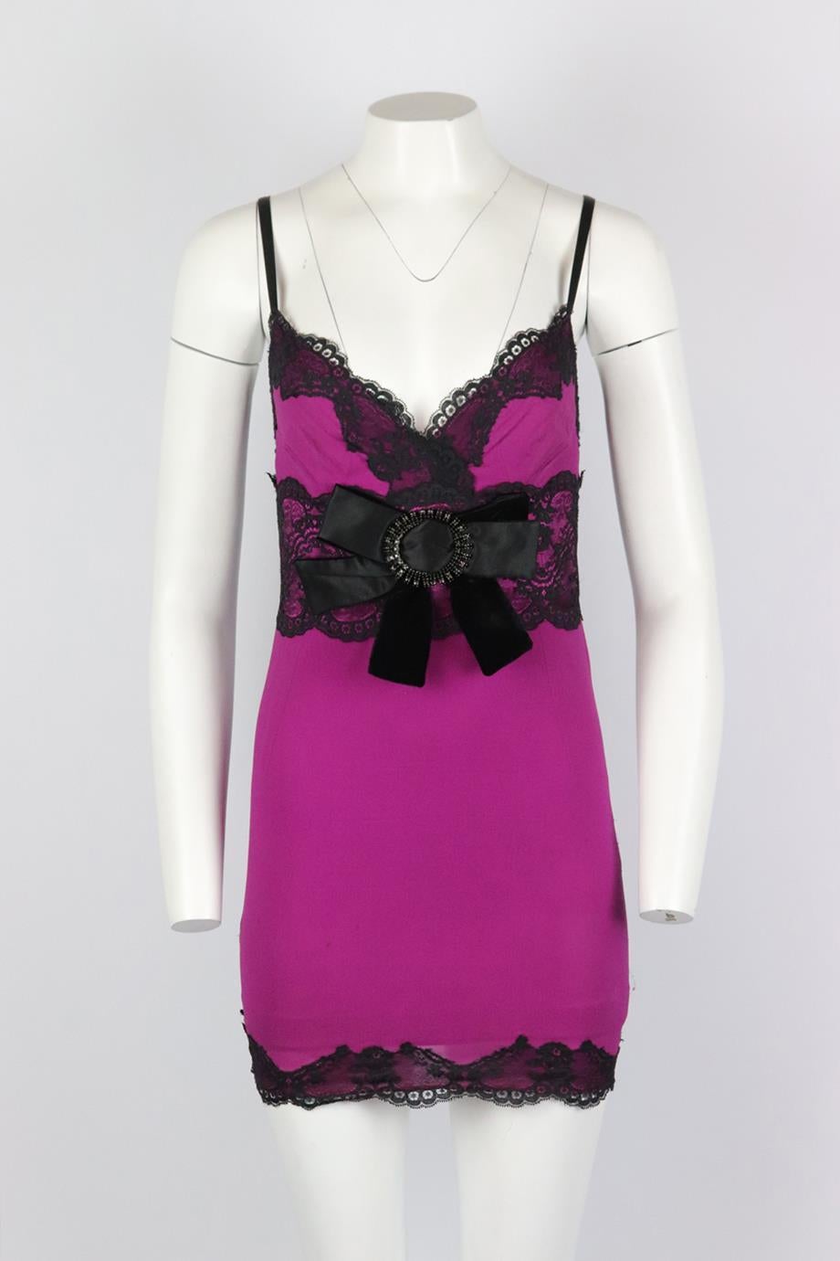 Dolce & Gabbana lace trimmed silk blend mini dress. Purple and black. Sleeveless, v-neck. Zip fastening at back. Size: IT 44 (UK 12, US 8, FR 40). Bust: 30 in. Waist: 28 in. Hips: 34 in. Length: 33 in. Fair condition - Some marks to exterior fabric.