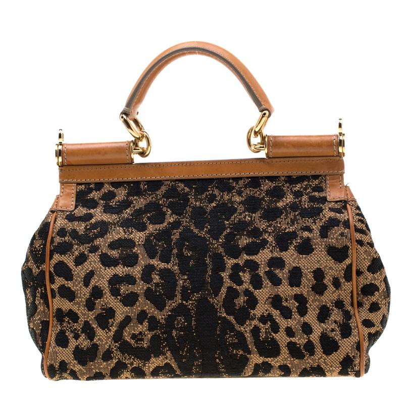 This gorgeous Miss Sicily bag from Dolce & Gabbana is a handbag coveted by women around the world. It has a well-structured design and a flap that opens to a compartment with fabric lining and enough space to fit your essentials. The bag comes with