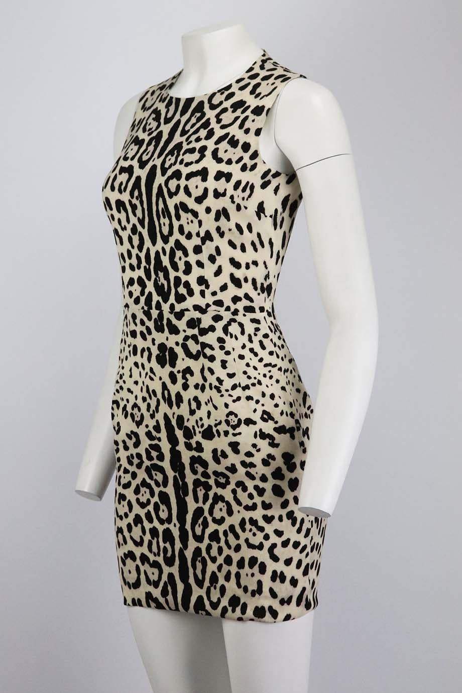 This dress by Dolce & Gabbana is made in Italy from silk-blend charmeuse, this dress has a round neckline and slim fit that nips in especially close at the waist and is finished with the brand’s signature leopard spots. Black, beige and grey