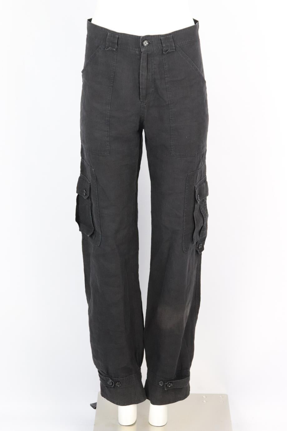 Dolce & Gabbana linen tapered cargo pants. Black. Button and zip fastening at front. 100% Linen. Size: IT 38 (UK 6, US 2, FR 34). Waist: 30.2 in. Hips: 41.5 in. Length: 43 in. Inseam: 33.5 in. Rise: 11 in. Very good condition - Light signs of wear;