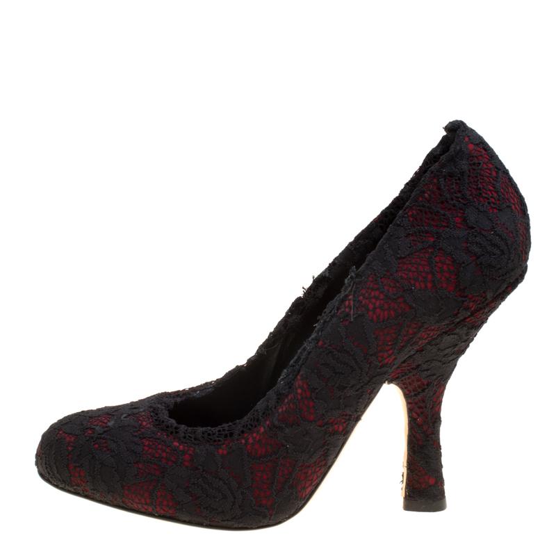 These scintillating maroon and black pumps from Dolce and Gabbana will take your breath away with their fabulous design and craftsmanship. They are crafted from satin and styled with an overlay of floral Chantilly lace all over them. They flaunt