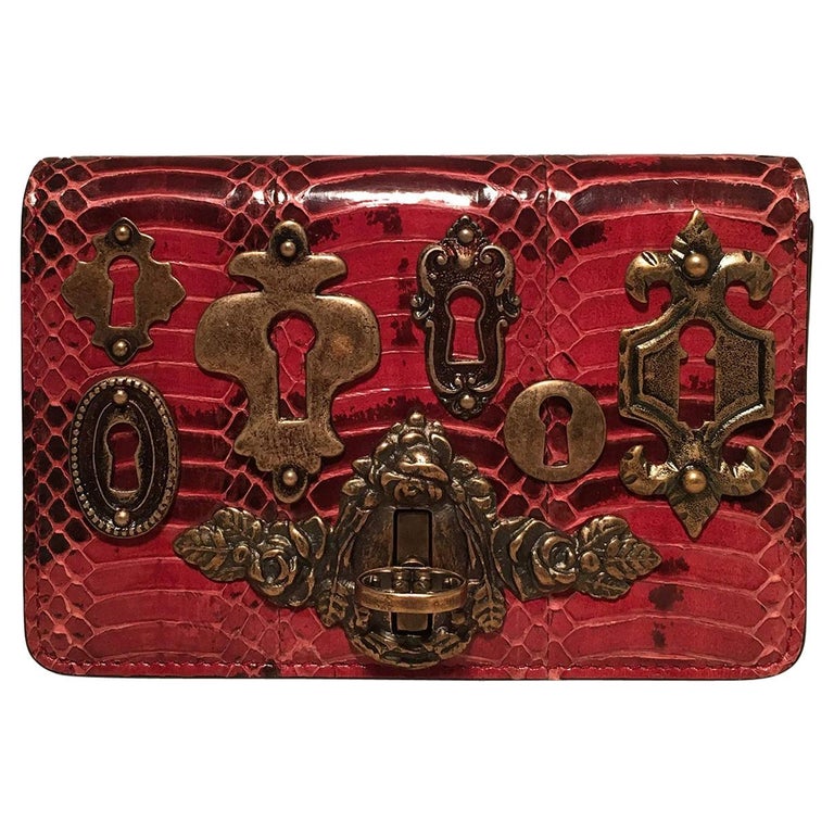 Dolce and Gabbana Maroon Snakeskin Keyhole Clutch Bag For Sale at