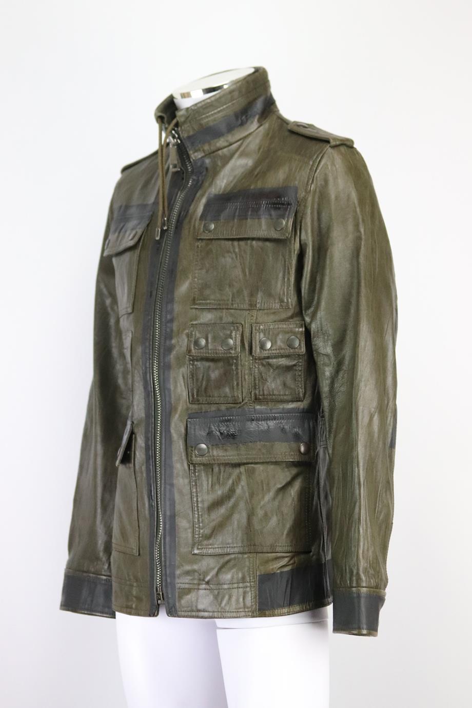 Dolce & Gabbana men’s leather jacket. This jacket is made from green leather with black pvc details and finished with multiple pockets for a utility feel. Green and black. Zip fastening at front. 85% Sheepskin, 15% pvc; lining: 100% rayon. Size: IT