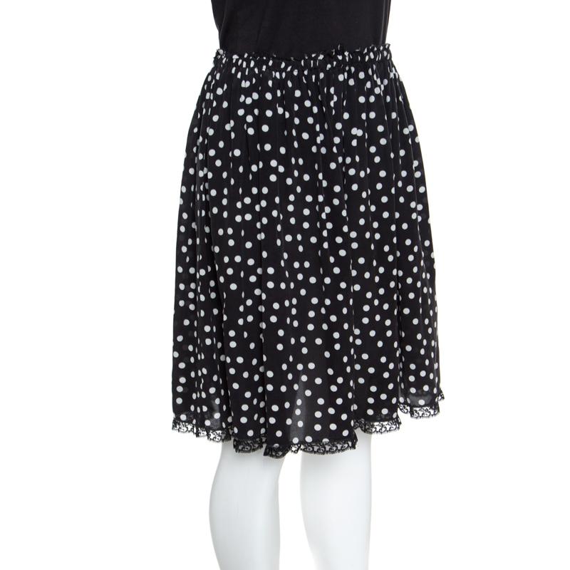 How stylish is this skirt from Dolce&Gabbana! Tailored from silk, the skirt has polka dots all over and lace trims. You can team it with an off-shoulder top and high heels.

Includes: Packaging

