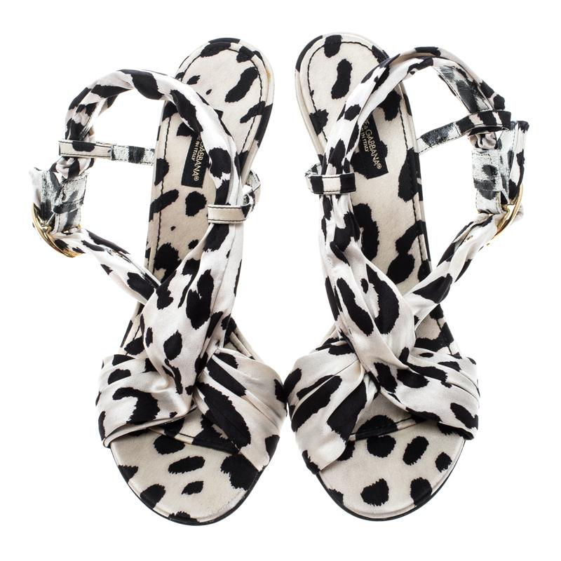 Feminine and absolutely plush, these Dolce&Gabbana sandals are what your shoe collection needs. They've been crafted from leopard-printed silk blend and styled with buckles, slingbacks and 11.5 cm heels.

Includes: Original Dustbag

