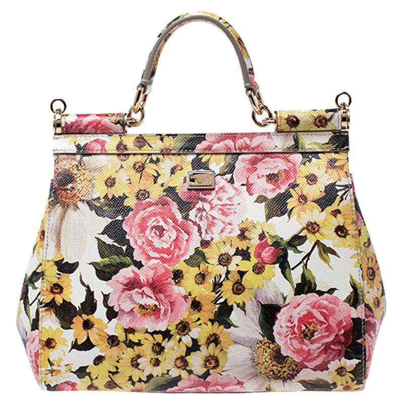 Miss Sicily handbag is one of the most celebrated creations from Dolce & Gabbana. The bag beautifully embodies the spirit of extravagance and feminity that the Italian luxury brand carries. Crafted from leather, the bag features a multicoloured