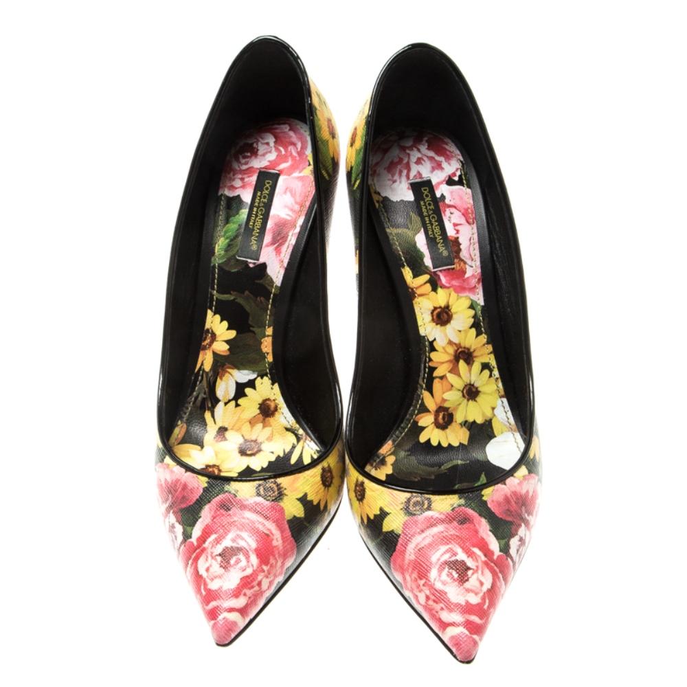Add these stunning Dolce and Gabbana pumps to your collection and be glamorously ready for those day time parties and events. Constructed in multicoloured floral printed Saffiano leather, these pointed-toe pumps feature 9.5 cm high stiletto