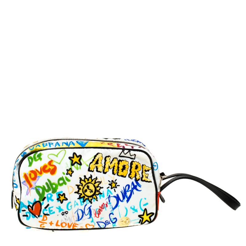 This pouch from the house of Dolce & Gabbana has been expertly crafted from graffiti-printed nylon and secured with a zip. It comes with a leather strap and a nylon interior that can easily hold your little essentials.

Includes: The Luxury Closet