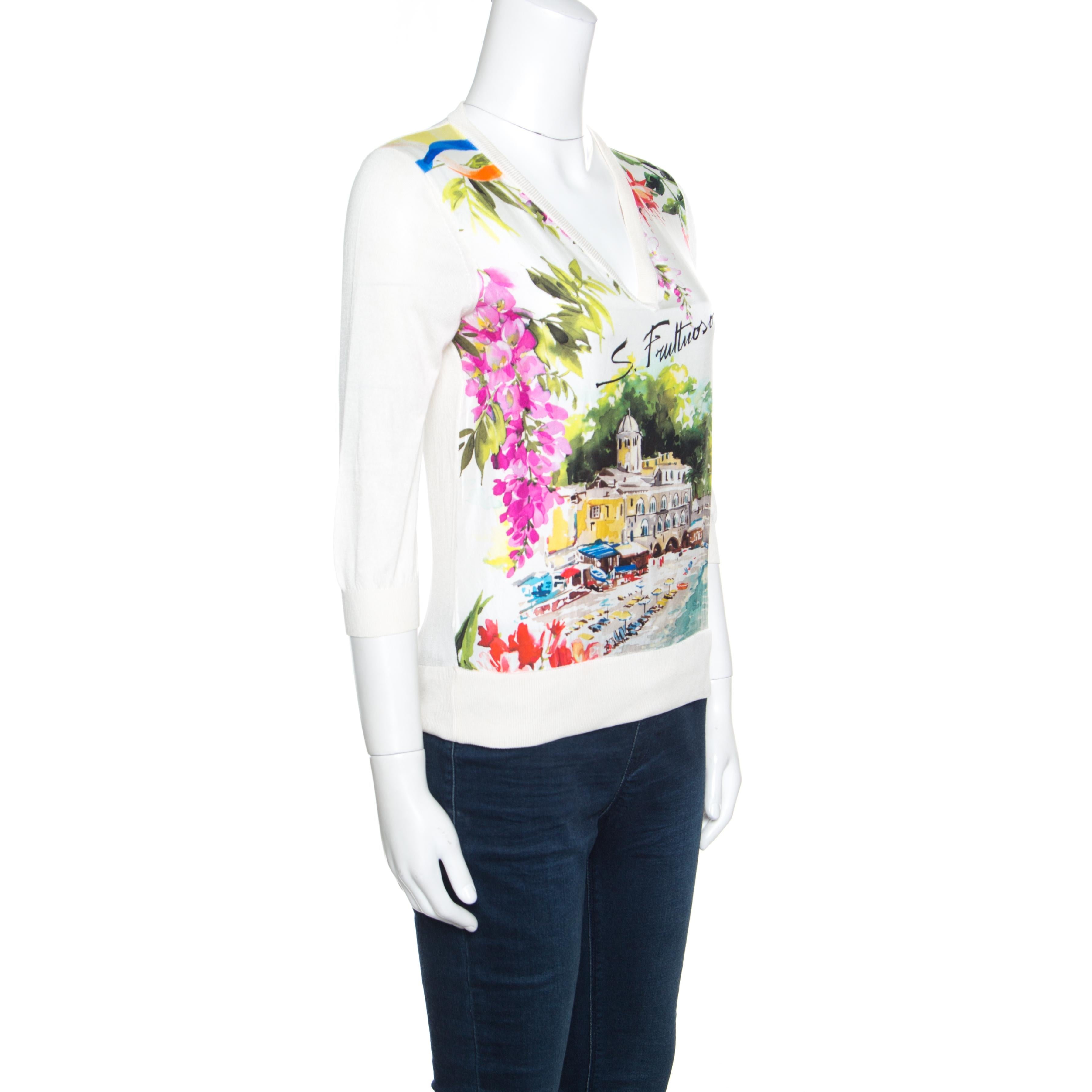What a wonderful sight this sweater from Dolce&Gabbana brings! Made beautifully from silk, the sweater brings long sleeves, a V neck and Portofino print on the front. You can team it with high-waist pants, pumps and a Speedy bag.

Includes: