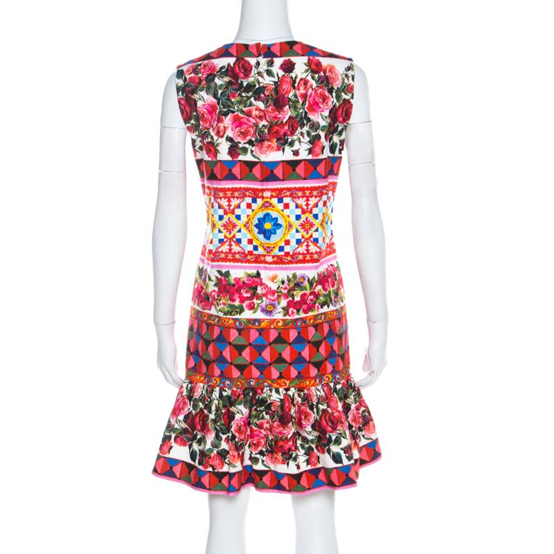 Sport this impressive piece from the house of Dolce and Gabbana. Go all out and style this dynamic multicolored printed dress with different accessories for a statement look. Masterfully crafted in stretchable cotton, this dress will make a great