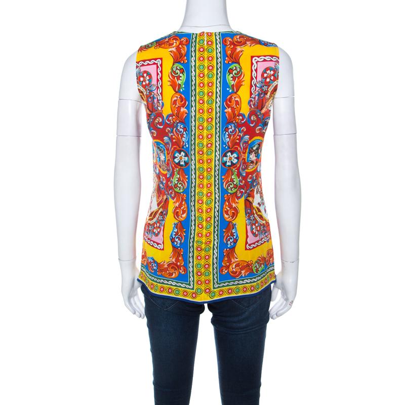 Essay vibrant fashion with this irresistible Dolce & Gabbana top. The expert use of colour and prints along with the high-quality fabric make this an ideal choice for events. Mix and match this one with solid-colored bottoms to create an enviable