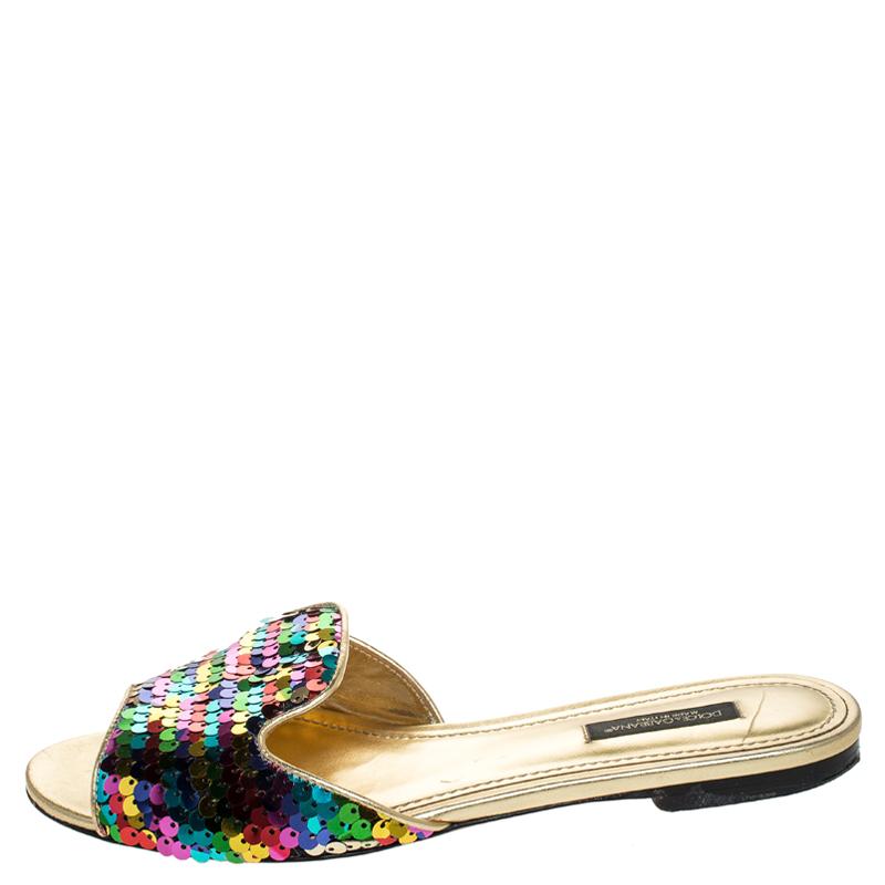 We can't stop gushing over these trendy slides from Dolce&Gabbana. They flaunt such exquisite details, like the sequins on the fabric uppers, the leather trims and open toes. You will truly love to own these beauties.

Includes: Original Dustbag,