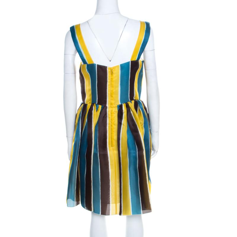 In a world full of high-fashion brands, the striped printed design of this Dolce & Gabbana dress just stands out. Launched as a part of the Spring 2013 collection, this multicolor piece is masterfully tailored from silk. This beautiful sleeveless