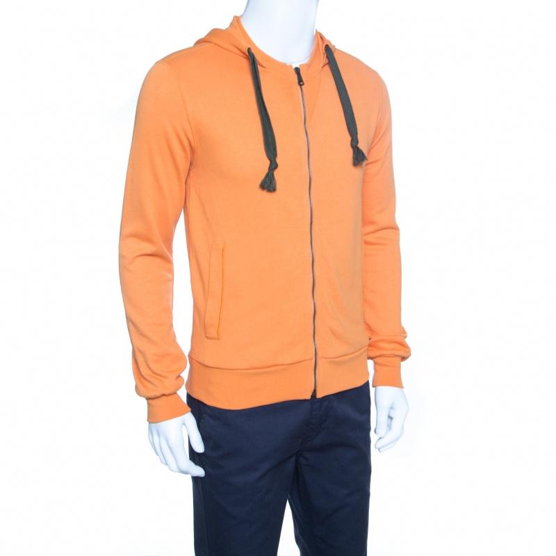 This orange hoodie from Dolce&Gabbana is simple and just the right choice for your casual style. It is made from cotton and designed with a full front zipper, long sleeves, and a hood.

Includes: Packaging
