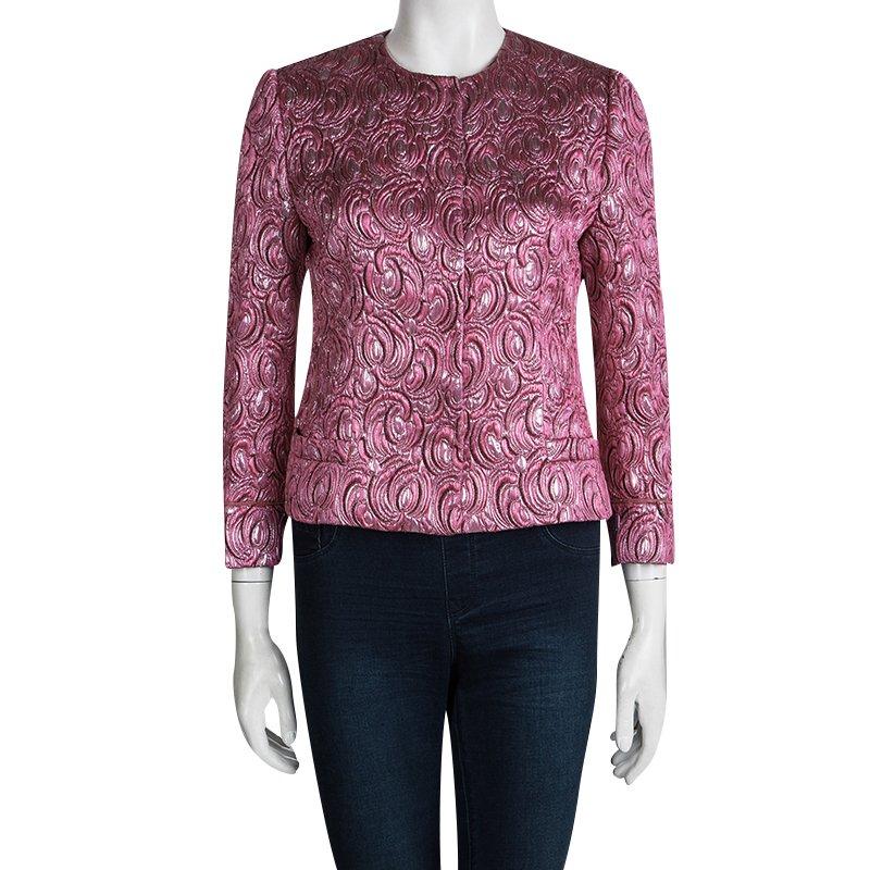 Embrace elegance in an effortless way with this Dolce and Gabbana jacket that was created in Italy from wool, silk, polyester, and acrylic. Designed in a Jacquard pattern with long sleeves, round neck and multi pockets on the front, this Boucle