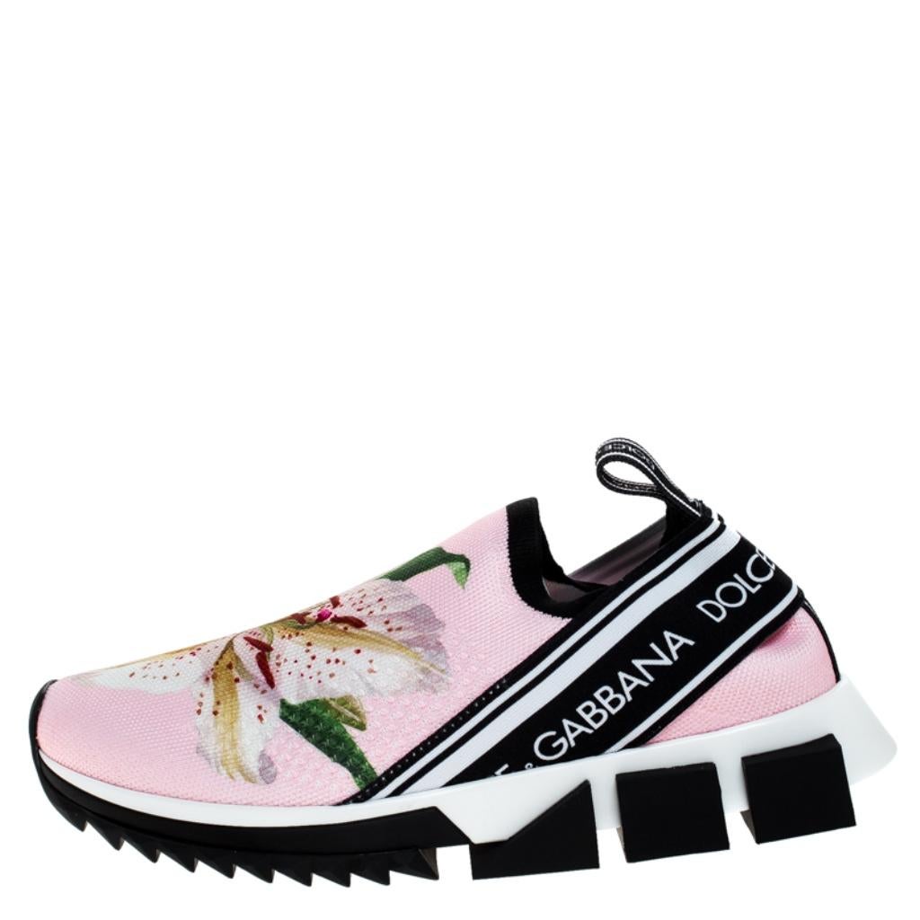 Flaunt your love for fashion by wearing these popular Sorrento slip-on sneakers from Dolce&Gabbana. These trendy pink sneakers are versatile and can be worn on any occasion. They are expertly crafted from stretch fabric and feature logo tape on the