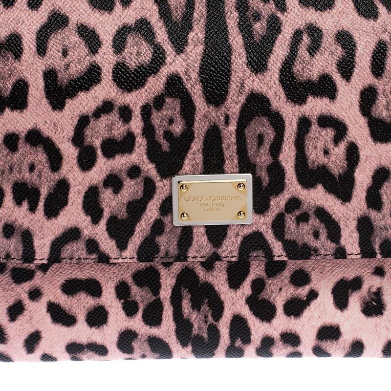 This gorgeous leopard print Miss Sicily bag from Dolce & Gabbana is a handbag coveted by women around the world. It has a well-structured design and a flap that opens to a compartment with fabric lining and enough space to fit your essentials. The