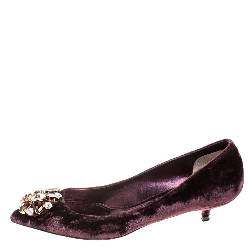 Deliver the most unforgettable looks in these Purple pumps from Dolce&Gabbana! From their shape and detailing to their overall appeal, they are utterly mesmerizing. The pumps are crafted from velvet and decorated with crystals on their pointed toe