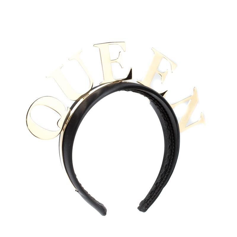 This Dolce&Gabbana headband brings a fun style. It is wrapped in black satin and detailed with gold-tone metal and the word 'QUEEN'. This lovely headband creates a look for you that you can easily call your crowning glory.

Includes: Original