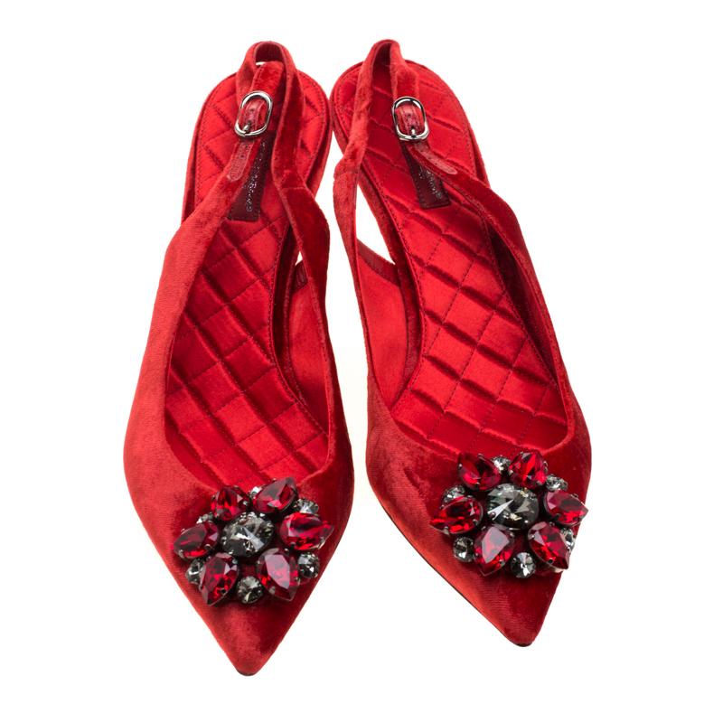Deliver the most unforgettable looks in these red sandals from Dolce & Gabbana! From their shape and detailing to their overall appeal, they are utterly mesmerizing. The sandals are crafted from velvet and decorated with crystals on their pointed