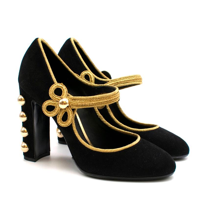 Dolce and Gabbana Military Suede Vally Pumps

- Black suede with Gold Piping
- Military styled
- Mary Jane cut
- Round toe
- Block heel 
- Gold studs on heel

- 2016/2017 D&G Runway

Materials:
- 100% Lambskin

Made in Italy 

Please note, these