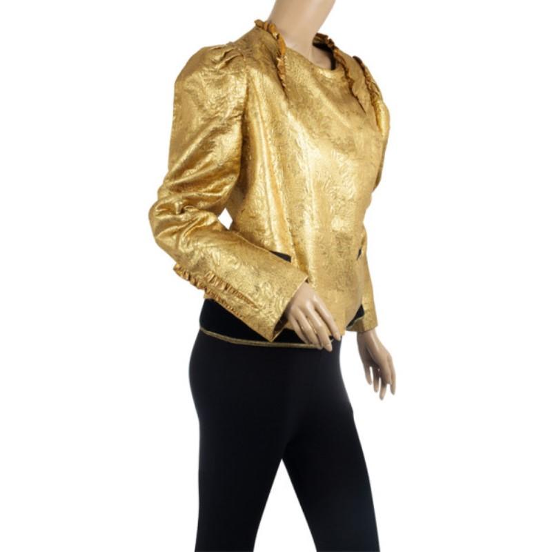 Add on this luxe jacket by Dolce and Gabbana to your evening outfit for a dazzling gold finish. This brocade jacket is lined with 100% silk and is accented with lambskin detailing at the neckline.

Includes: The Luxury Closet Packaging

