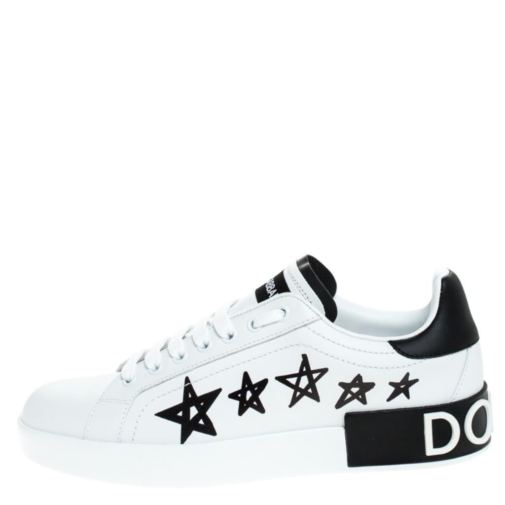 You're sure to feel like a star in these sneakers from Dolce&Gabbana. Made from white leather, the shoes carry round toes, lace-ups and detailing of stars and the brand name. They are sure to lend one the perfect combination of comfort and