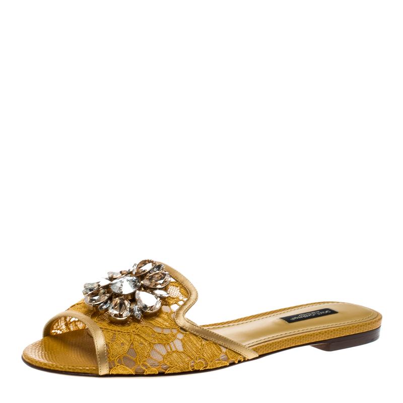 These Dolce&Gabbana slides are made with satin, lace, and mesh, while the insoles are lined with leather. What makes these slides so desirable are the breathtaking crystals embellished on the vamps. This is definitely one pair that speaks beauty in