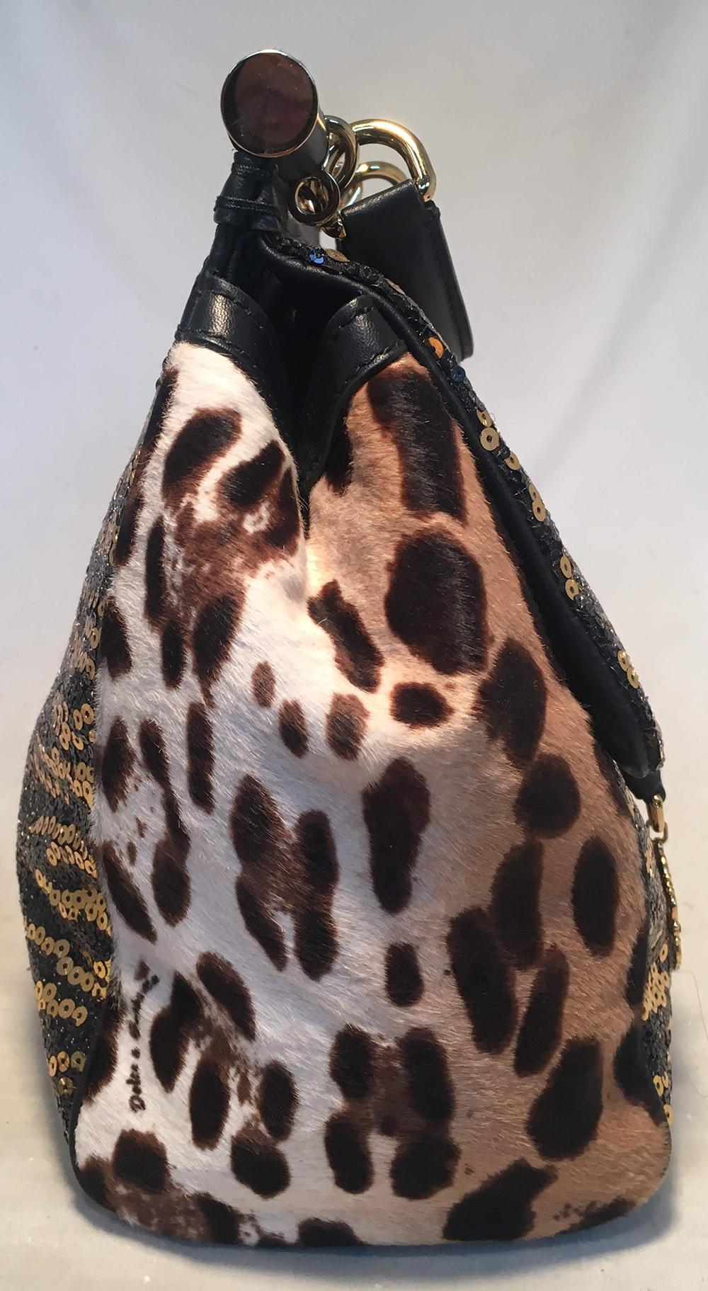 Dolce and Gabbana Sequin and Leopard Print Fur XL Miss Sicily Bag in very good condition. Classic Miss Sicily style with black and gold sequin front and top flap in zebra striped pattern with brown and black and white and brown leopard print pony