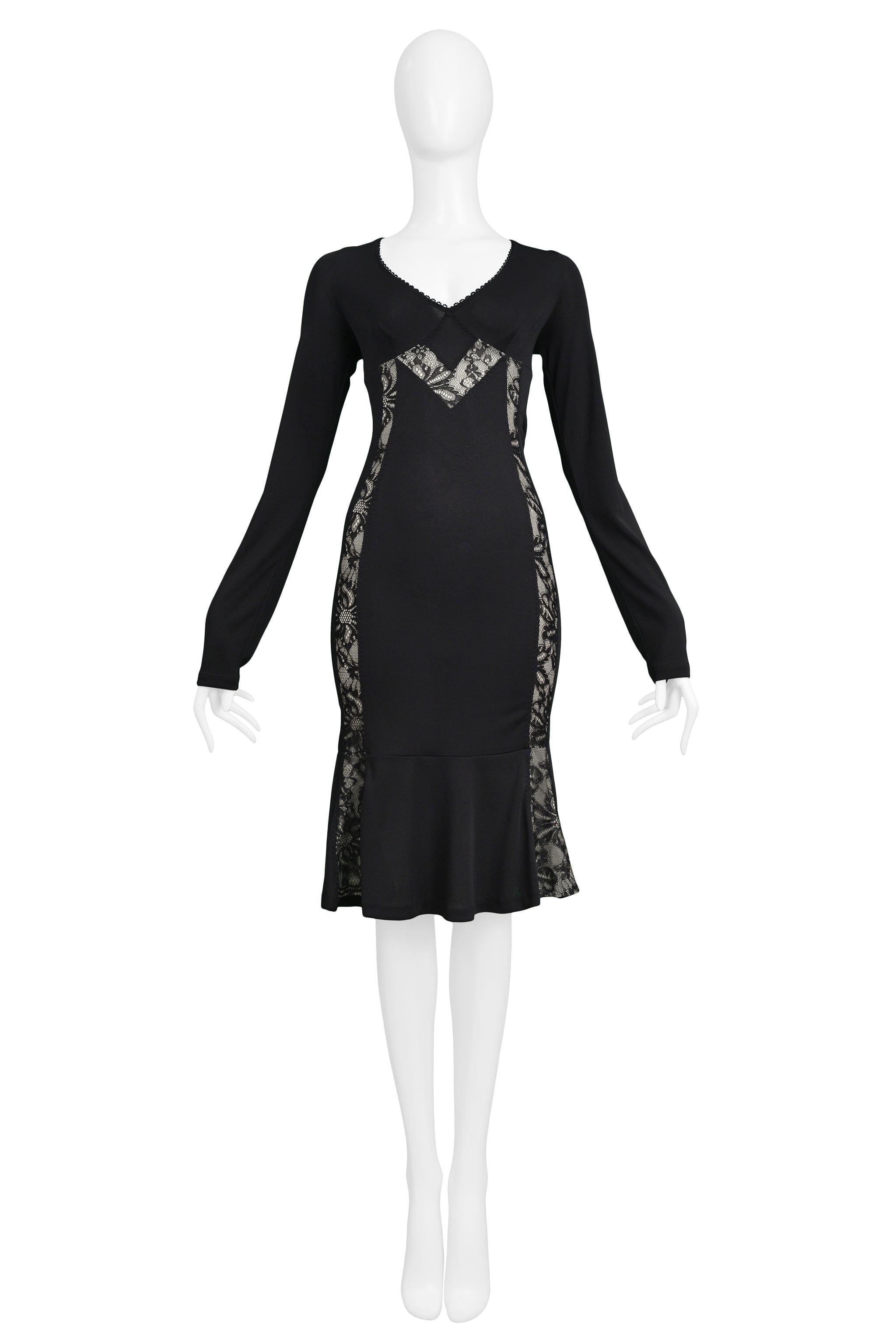 Resurrection Vintage is excited to offer a vintage Dolce & Gabbana D&G black cocktail dress featuring long sleeves and lace insets.  

Dolce & Gabbana D&G
Size 44
Measurements: (flat unstretched) Bust 32