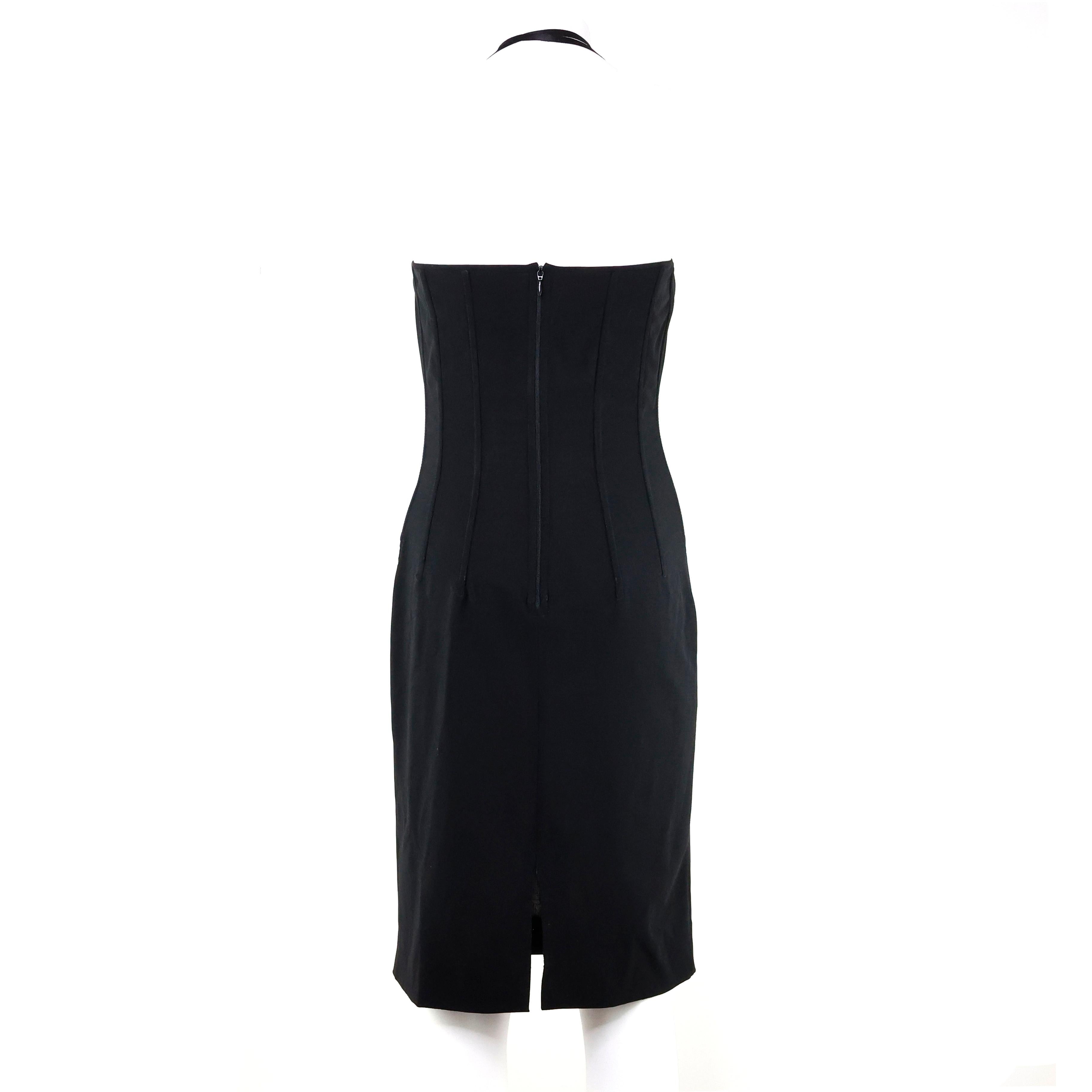 Dolce e Gabbana - Robe corset noire en laine. Taille 40 IT.

Condit :
Très bon/bien. A noter : petites taches, veuillez vérifier les photos.