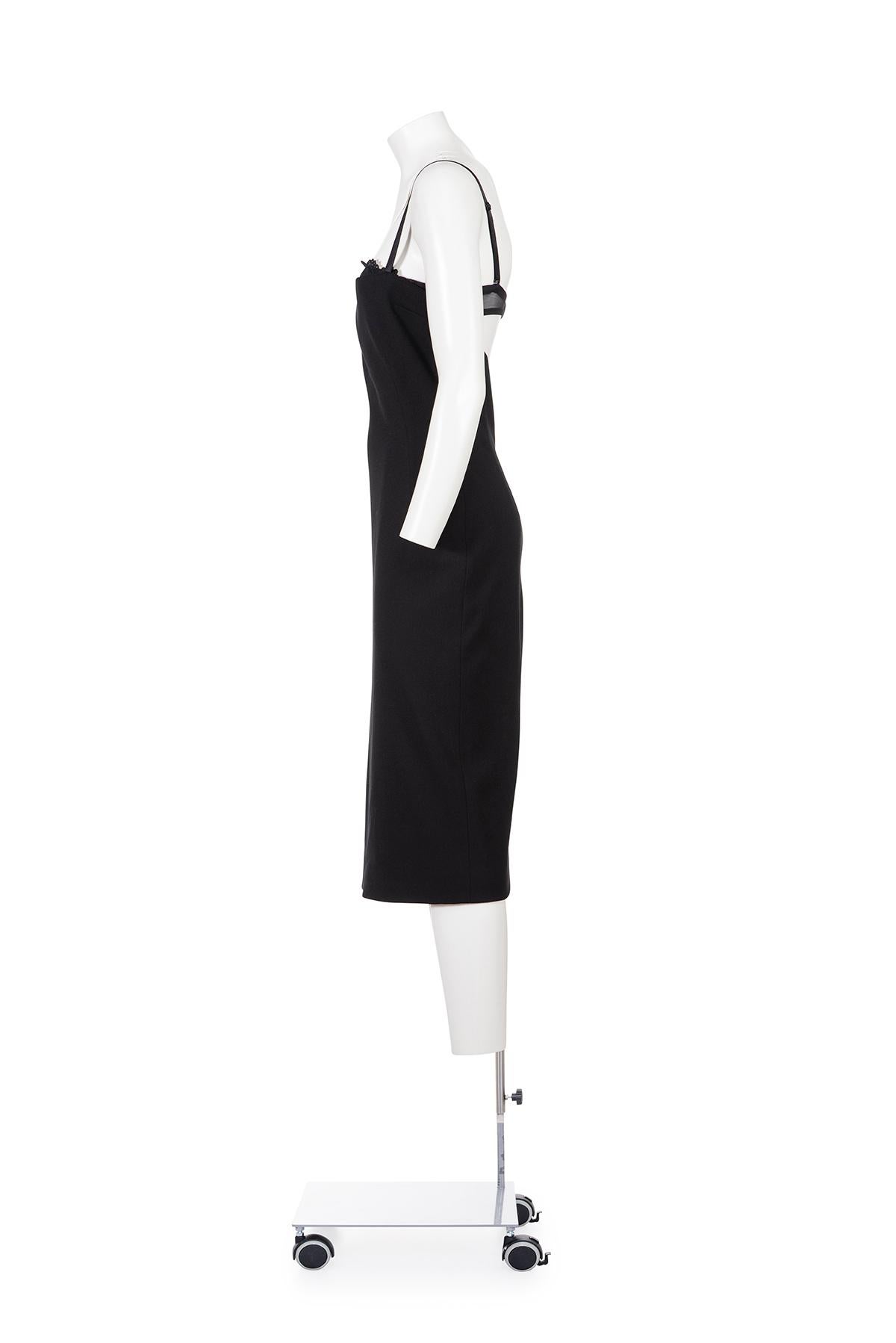 00's pencil dress with lace bra attached by Dolce & Gabbana
Back zipper closure
98% virgin wool 2% elastane
