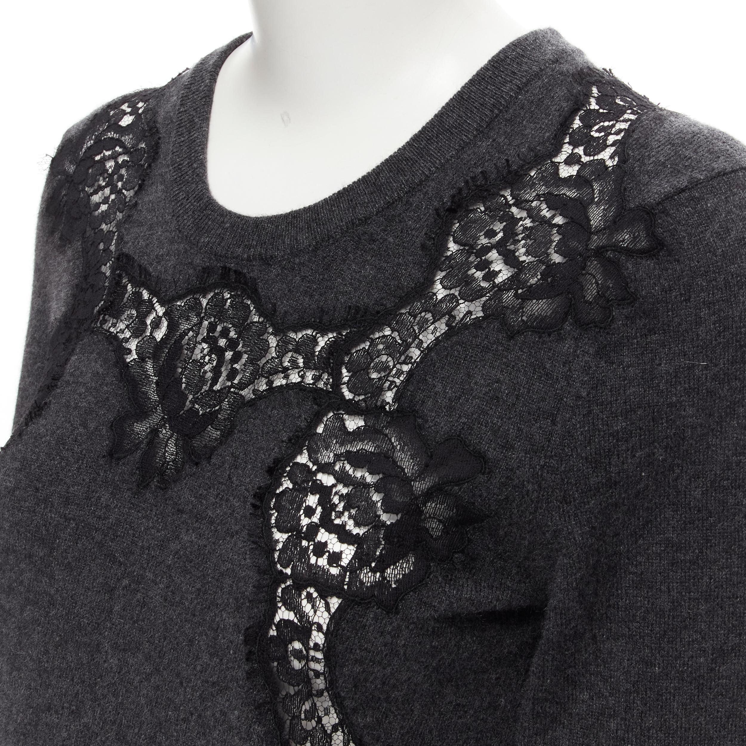 DOLCE GABBANA 100% cashmere grey black floral lace insert pullover sweater IT44 M
Reference: MELK/A00047 
Brand: Dolce Gabbana 
Material: Cashmere 
Color: Grey 
Pattern: Solid 
Extra Detail: Floral lace applique. 
Made in: Italy 

CONDITION: