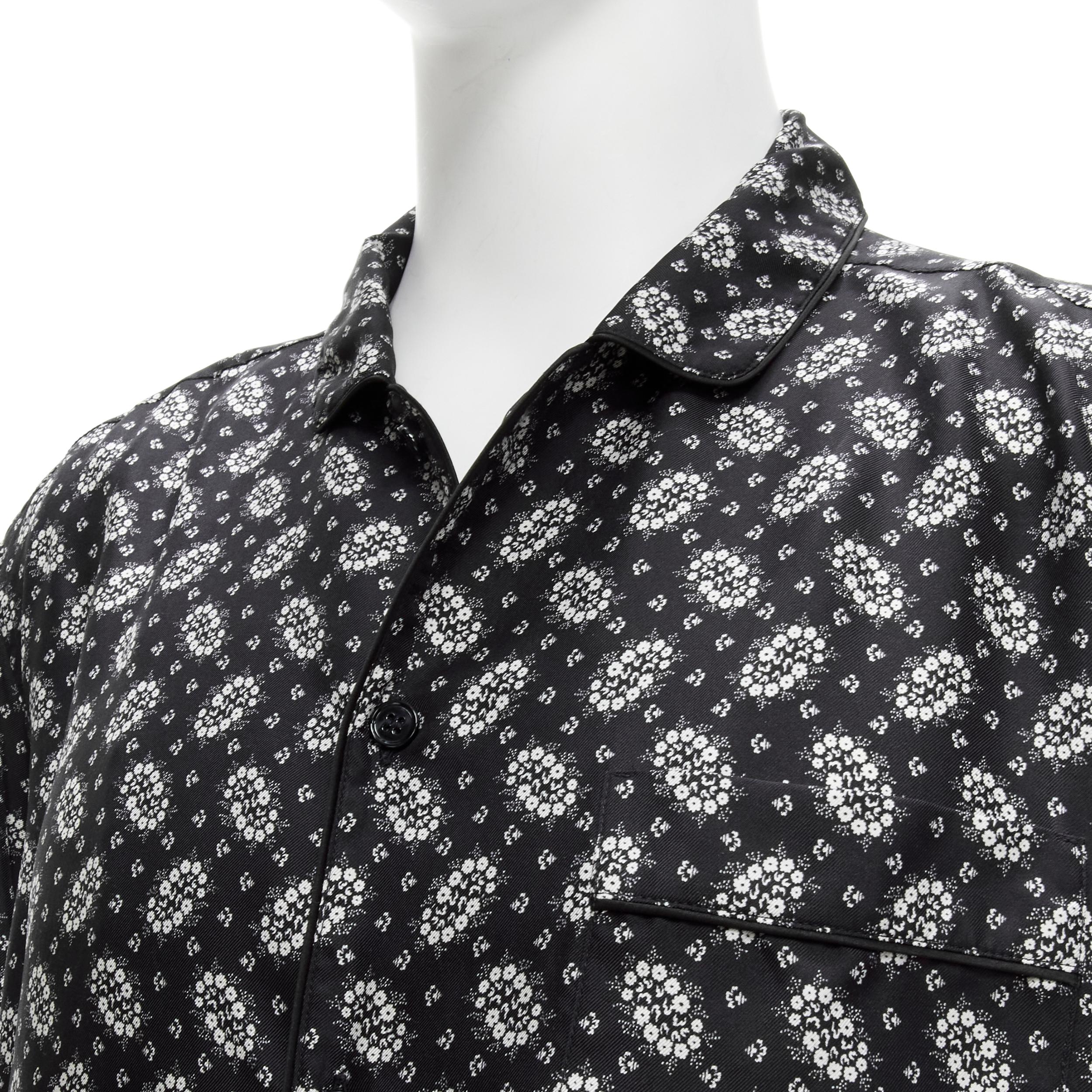 DOLCE GABBANA 100 silk black white floral print pajama shirt IT5 L 
Reference: CNLE/A00170 
Brand: Dolce Gabbana 
Material: Silk 
Color: Black 
Pattern: Floral 
Closure: Button 
Made in: Italy 

CONDITION: 
Condition: Excellent, this item was