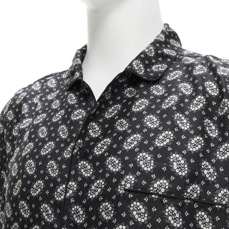 DOLCE GABBANA 100 silk black white floral print pajama shirt IT5 L
Reference: CNLE/A00170
Brand: Dolce Gabbana
Designer: Domenico Dolce and Stefano Gabbana
Material: Silk
Color: Black, White
Pattern: Floral
Closure: Button
Made in: