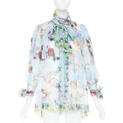 DOLCE GABBANA  100% silk blue Cherub Cupids print pussybow sheer blouse IT40 S