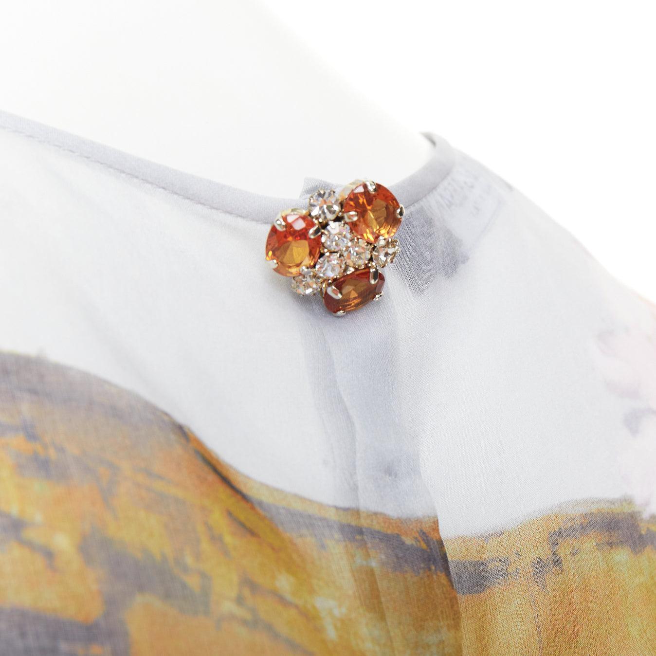 Dolce & Gabbana 100% soie diaphane Rome Ruins top à imprimé floral trou de serrure IT36 XXS
Référence : MECG/A00188
Marque : Dolce Gabbana
Designer : Domenico Dolce et Stefano Gabbana
MATERIAL : Soie
Couleur : Multicolore
Motif : Floral
Fermeture :