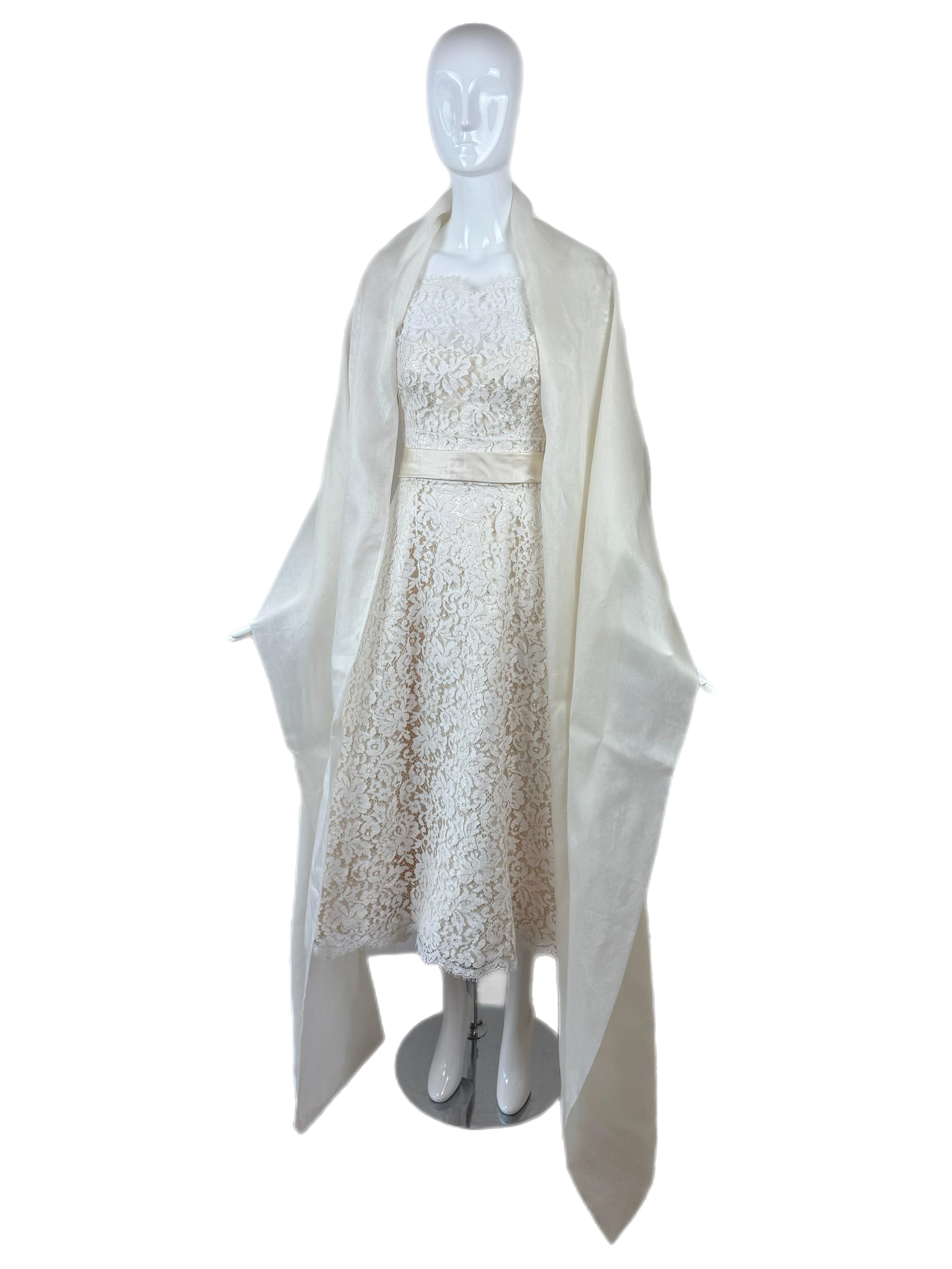 Dolce & Gabbana
Wedding Dress
Vintage
1993
Ivory white lace on top of silk vanilla underlay
Belted with floral applique in the back
Comes with huge oversized silk shawl
Unlined sheer sleeves and keyhole back
Dress is clipped to the mannequin, so in