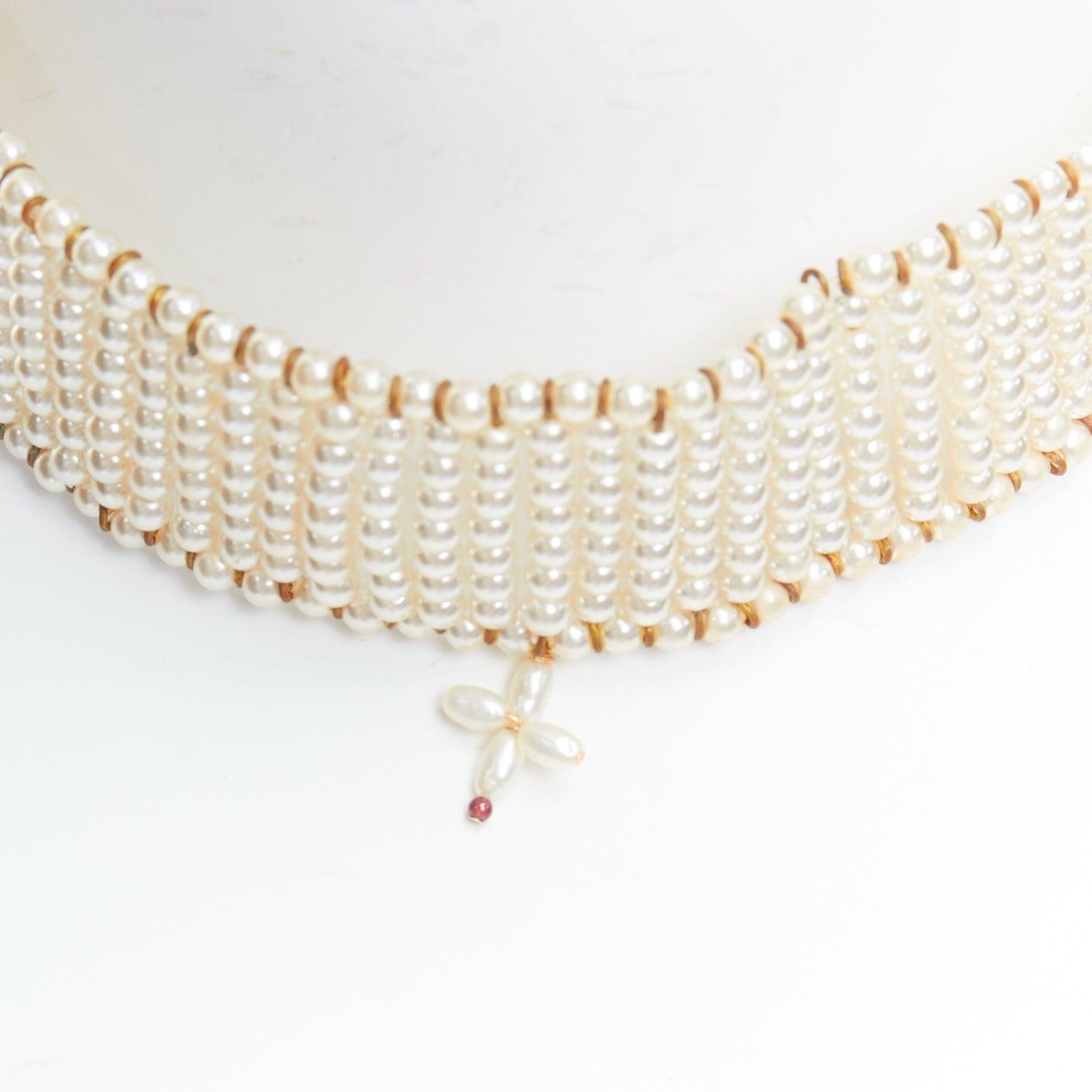 DOLCE GABBANA 1993 Vintage pearl crucifix cross tie back choker necklace
Reference: TGAS/E00226
Brand: Dolce Gabbana
Designer: Domenico Dolce and Stefano Gabbana
Collection: SS 1993
Material: Faux Pearl
Color: Pearl
Pattern: Solid
Closure: Tie