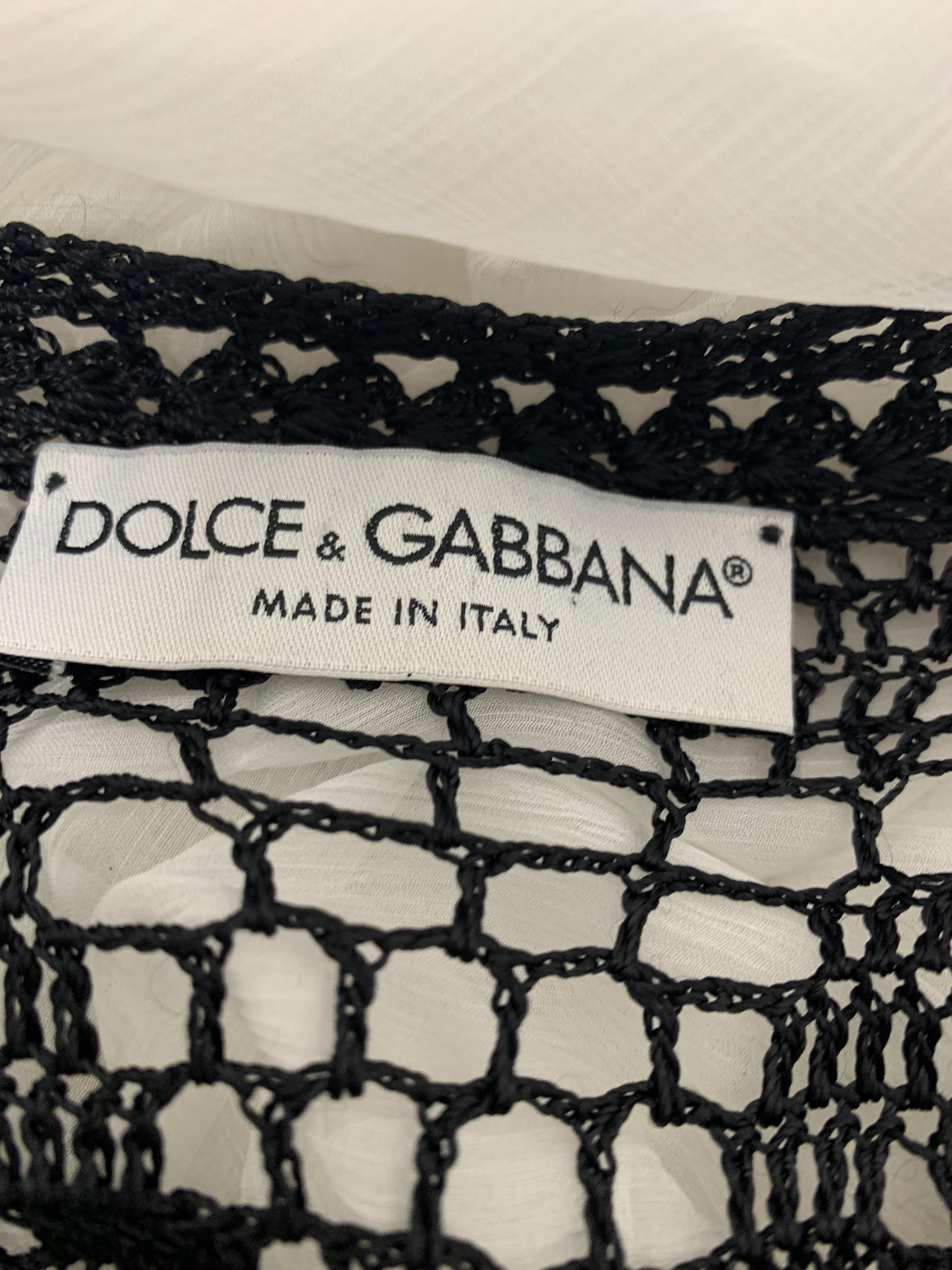 Dolce Gabbana 1997 black crochet knitted mini  dress
See through 
Great vintage condition 
Size label is missing. Fits like XS-S