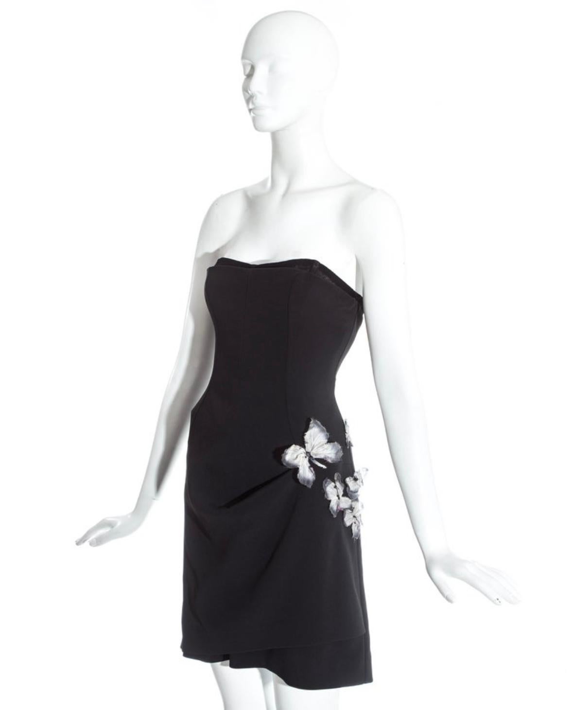 Iconic Dolce Gabbana SS 1998 black mini dress with floral/butterfly embellishments on the side 
Size 42 

Collector’s item
Good vintage condition. No rips or stains 