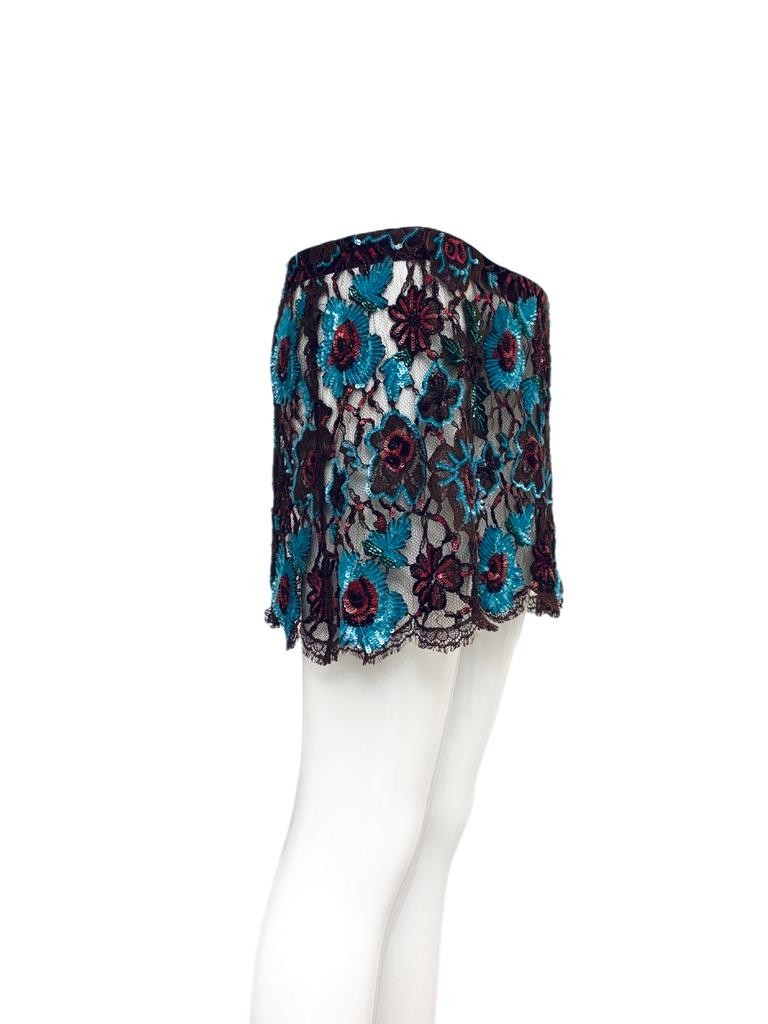 Dolce & Gabbana
FW99
Vintage
Runway
Beaded sequin embellished lace mini skirt
Meant to lay low on the hips
Size and comp tag cut out (maybe IT42)
Please see measurements below
Excellent condition, no flaws

Measurements in inches laying flat: top of