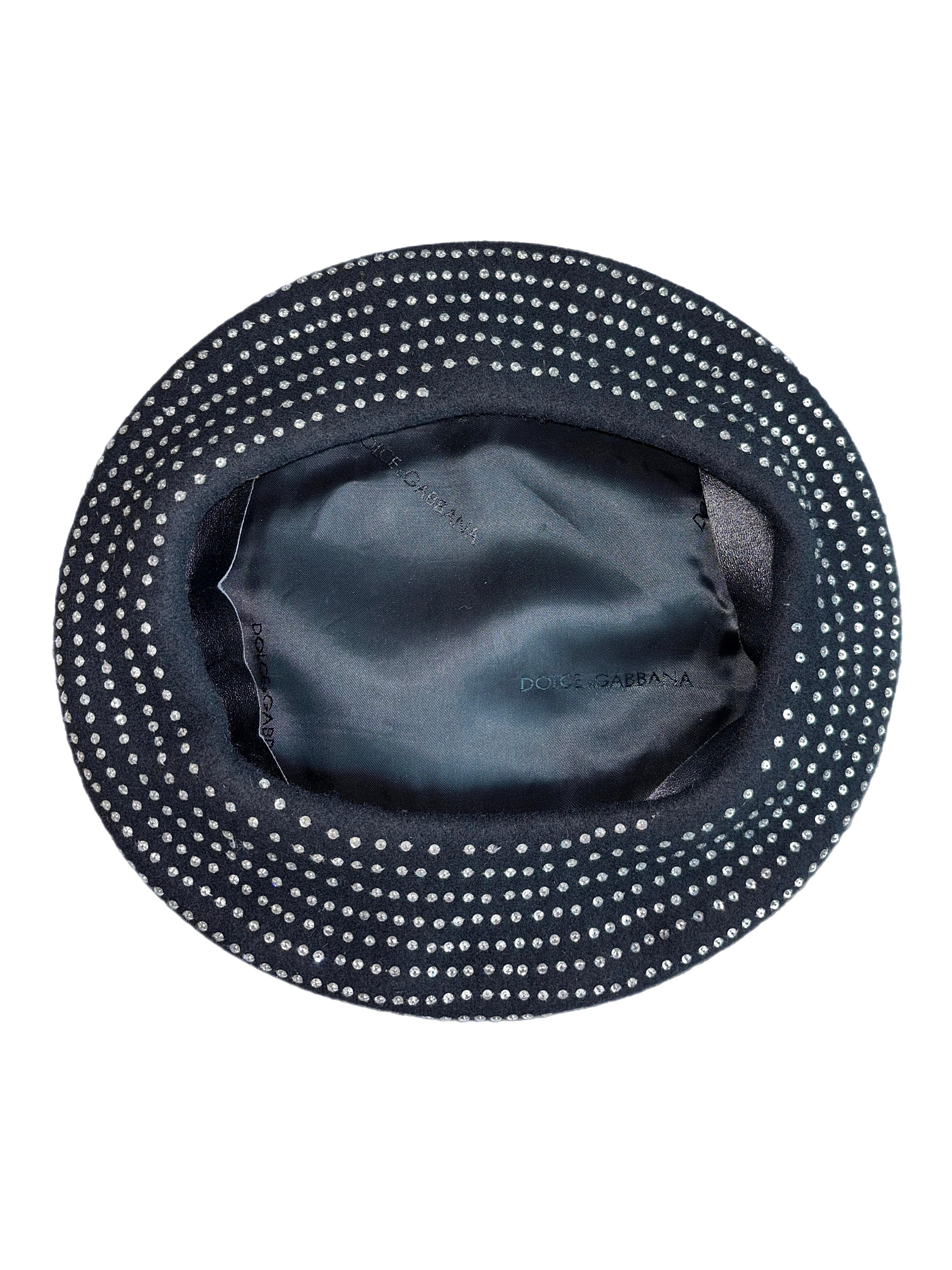 Dolce & Gabbana
FW00
Runway
Jet black wool with clear shiny crystals
Has just the right amount of sparkle ie the rhinestones are not saturating the cap
Size Medium but can also fit a size Small
Excellent Condition, no flaws

FINAL SALE