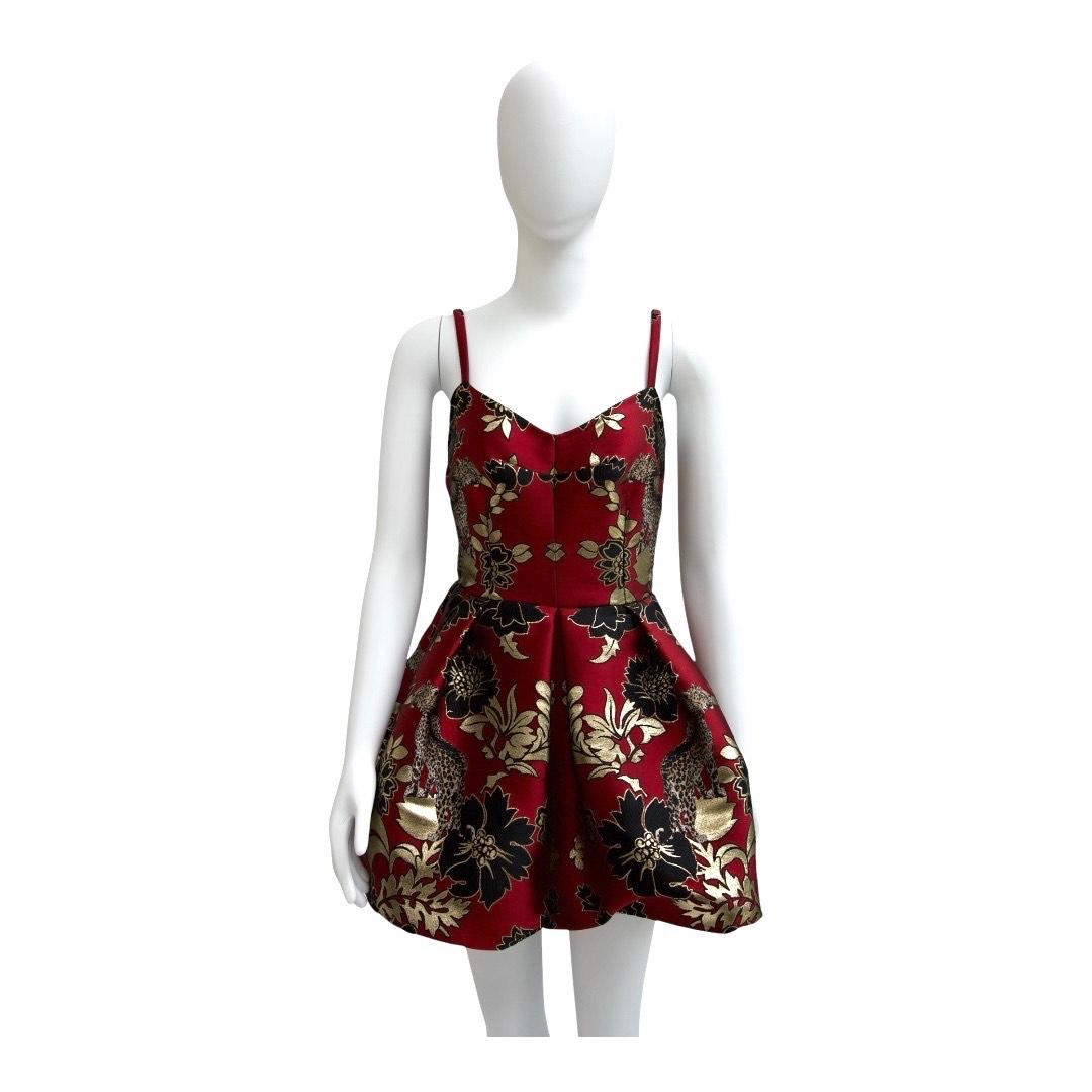 Dolce & Gabbana 2019 Red & Gold Brocade Mini Dress
Size 40 IT (Small)  Brand New with Original Tags

This red and gold floral and leopard brocade mini dress is an enchanting showcase of Dolce & Gabbana’s high-octane femininity. From the Summer 2019