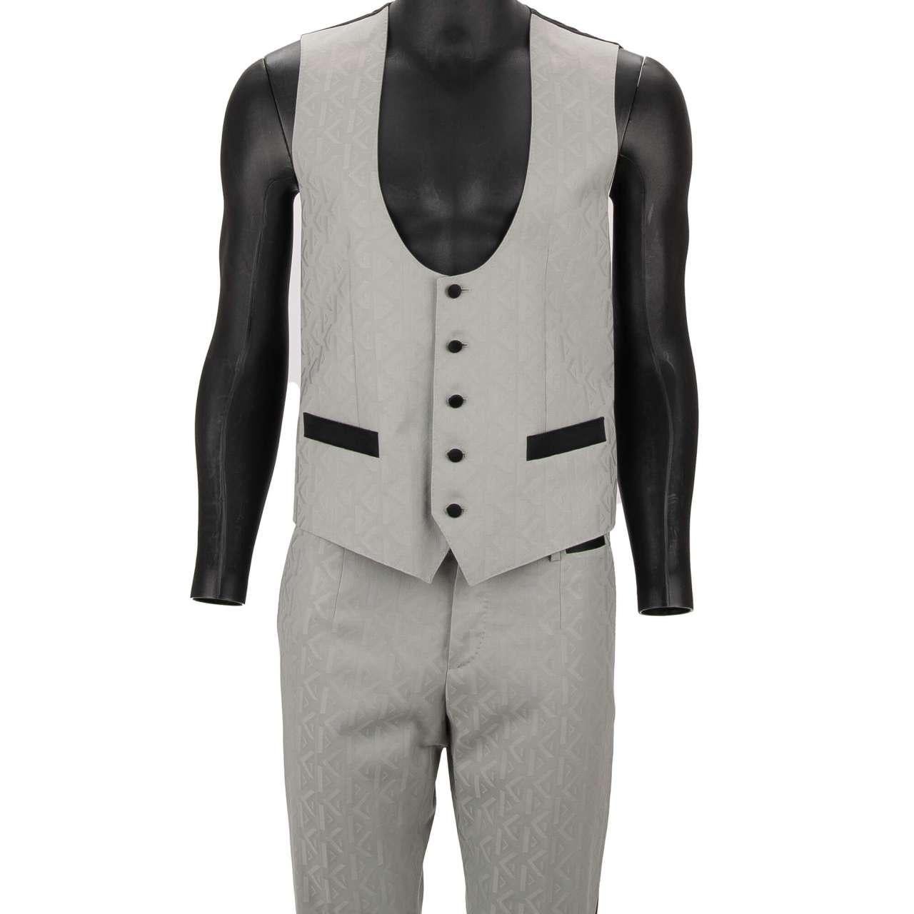 - Virgin wool 3 piece suit, jacket, waistcoat, pants with shawl silk lapel in gray and black by DOLCE & GABBANA - MARTINI Model - RUNWAY - Dolce & Gabbana Fashion Show - New with tag - Former RRP: EUR 3,350 - MADE in ITALY - Slim Fit - Model: