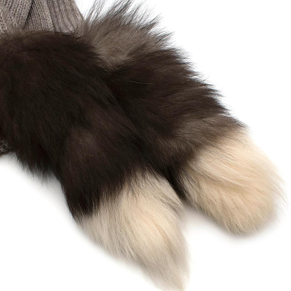 Dolce & Gabbana Alpaca Blend Knit Fox Fur Scarf

-Ribbed knit main body
-Silver fox fur application 
-Soft texture 
-Practical yet luxurious 

Materials:

45% acrylic
37% Alpaca 
18% Wool 
Fur application:
100% Silver fox fur 

Prof. fur cleaning