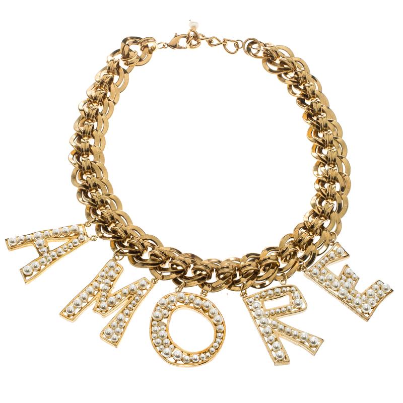 A necklace that literally spells love is the one that you must have! This beautiful necklace exuding a high-fashion vibe is from the Italian fashion house Dolce and Gabbana. It features a chunky braided chain which holds the AMORE charms embellished