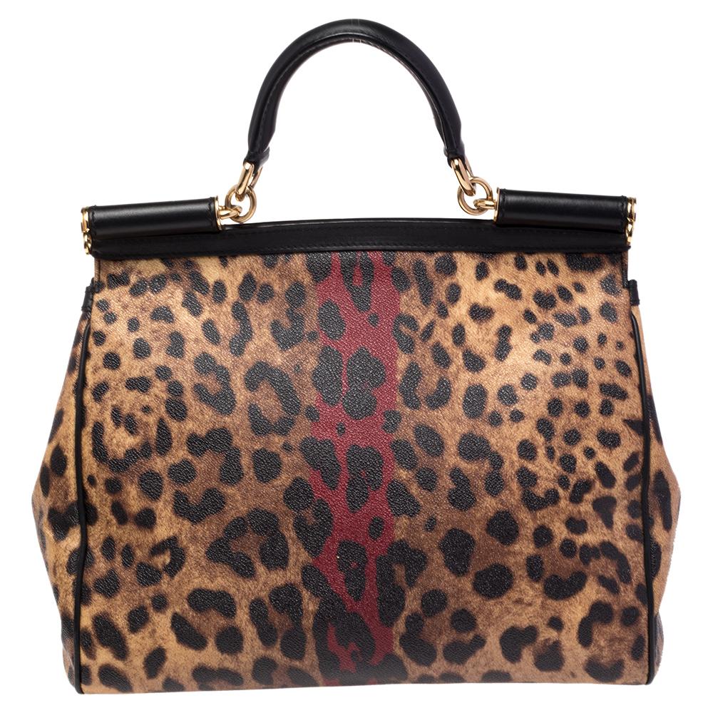The iconic Miss Sicily bag by Dolce & Gabbana is named after Domenico Dolce's native land and exhibits the aesthetic of Italian glamour. The neat silhouette is made from canvas and features animal prints with the signature logo plaque on the front.